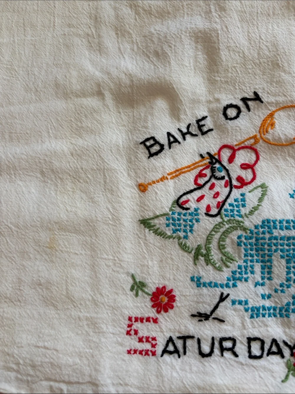 Embroidered 'Bake On Saturday' White Kitchen Tea Towel